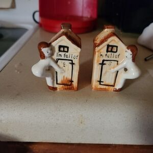 Outhouse, salt and pepper shakers.